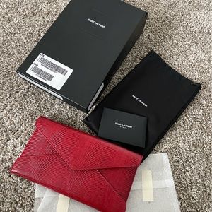 Saint Laurent (YSL) Snake Embossed Clutch